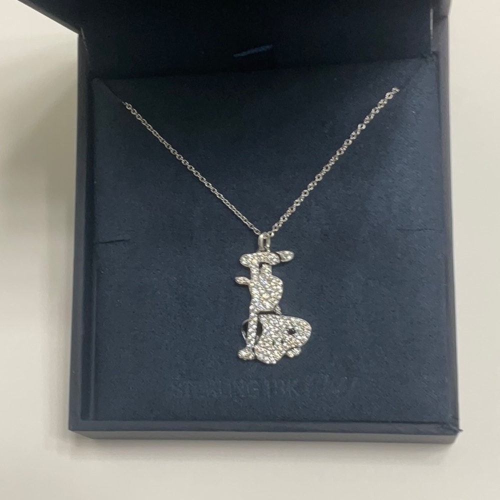 NWT  Crislu, Peanuts necklace, Snoopy upside down. Platinum plated, rare.